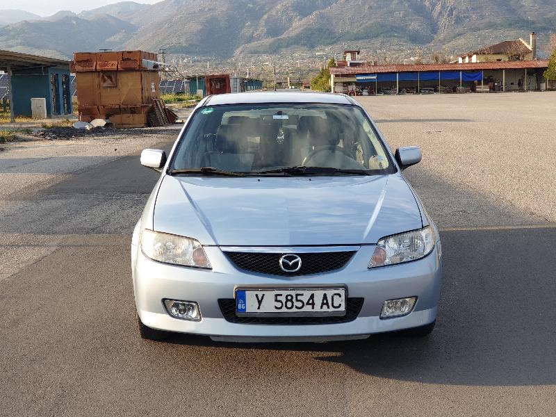 Mazda 323 1.6 Бензин и газ - изображение 3