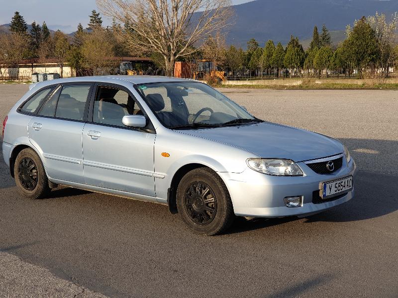 Mazda 323 1.6 Бензин и газ - изображение 4