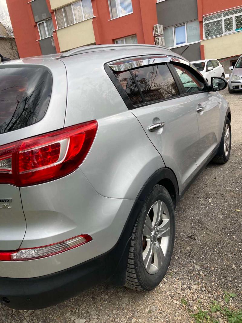 Kia Sportage 2.0  - изображение 7