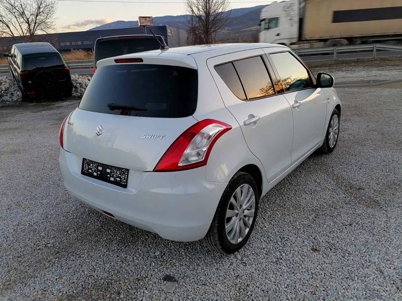 Suzuki Swift 1.3 - изображение 7