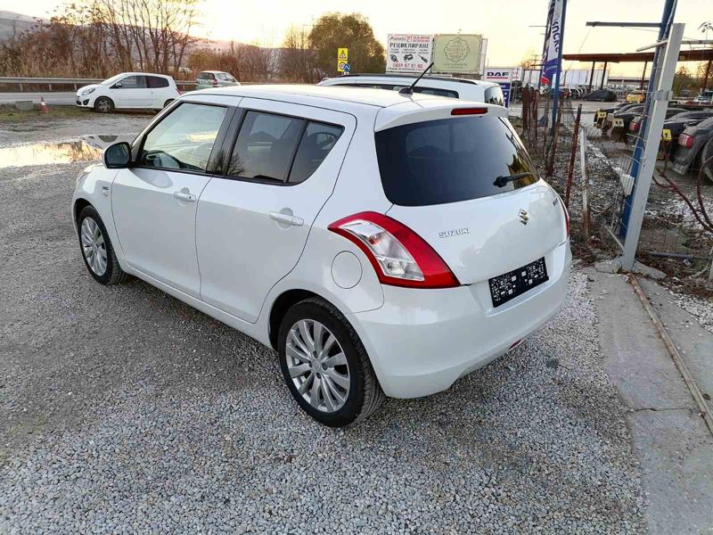 Suzuki Swift 1.3 - изображение 5