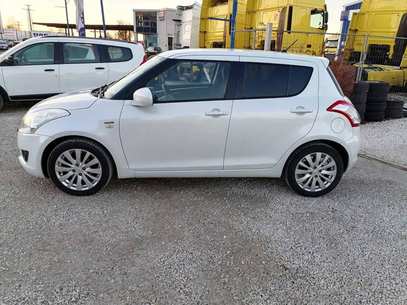 Suzuki Swift 1.3 - изображение 4