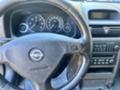 Opel Astra 2.0 - изображение 9