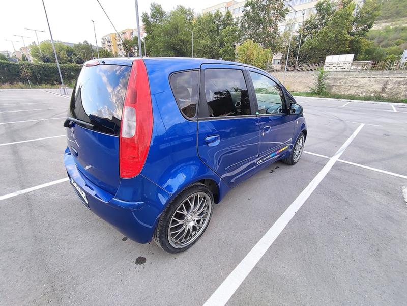 Mitsubishi Colt 1.3 - изображение 10