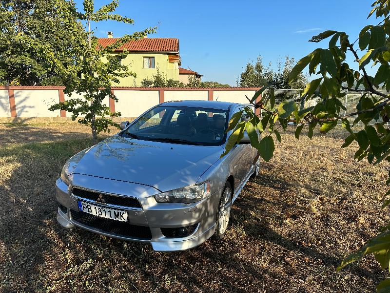 Mitsubishi Lancer 1.8  - изображение 8