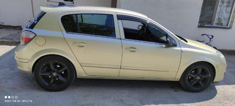 Opel Astra 1.8  - изображение 7