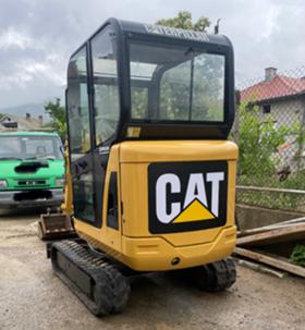 Багер Caterpillar 301.8C - изображение 1