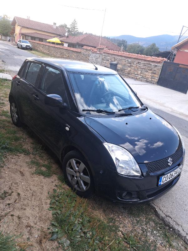 Suzuki Swift 1.3  - изображение 4