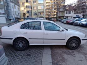 Обява за продажба на Skoda Octavia 1,6 ~5 399 лв. - изображение 4