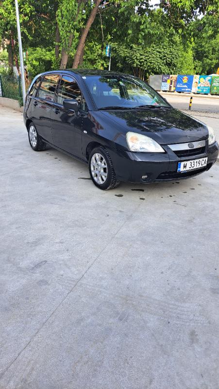 Suzuki Liana 1.6 - изображение 6