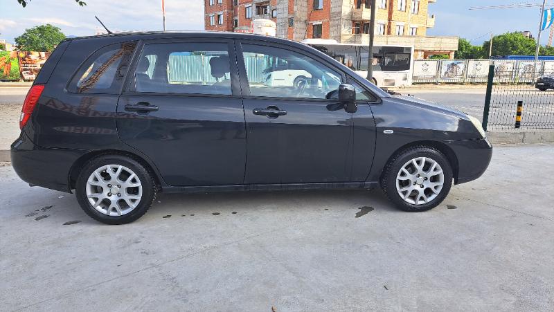 Suzuki Liana 1.6 - изображение 8