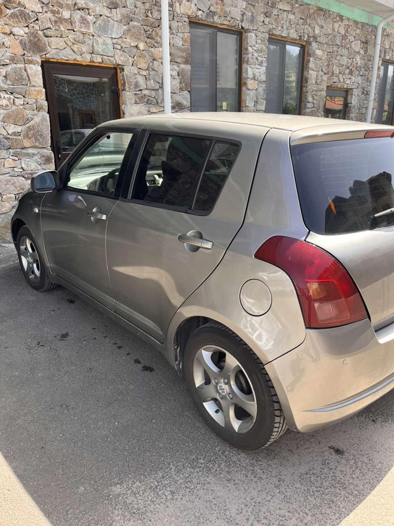 Suzuki Swift 1,3i - изображение 8