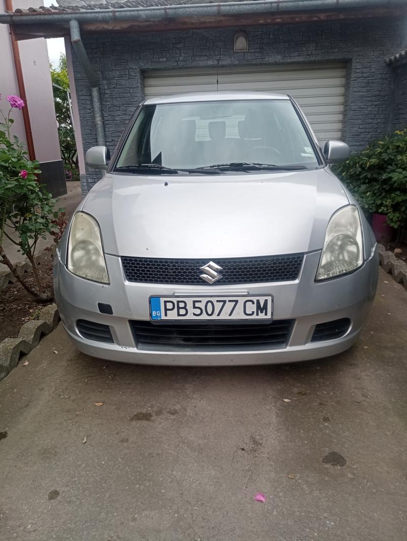 Suzuki Swift 1.3 - изображение 7