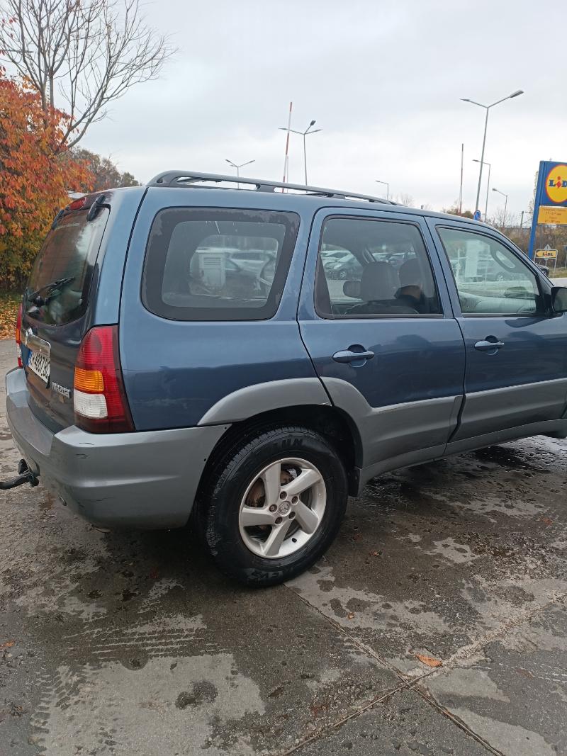 Mazda Tribute 3.0 V6 - изображение 4