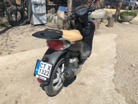 Piaggio Scarabeo  - изображение 3