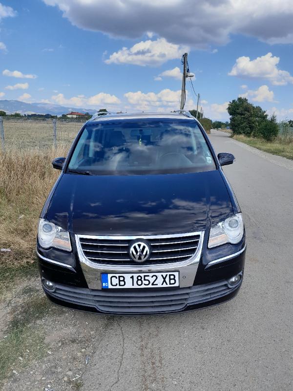 VW Touran 1.9 TDI 105 к.с. - изображение 2