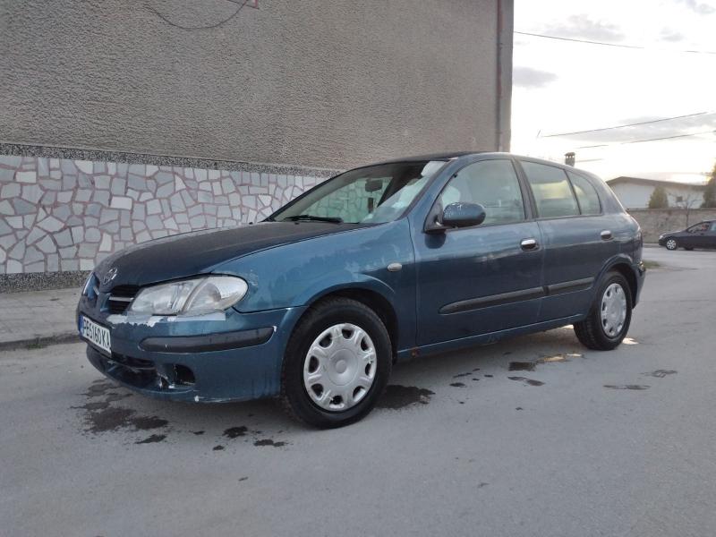 Nissan Almera 1.6 - изображение 10