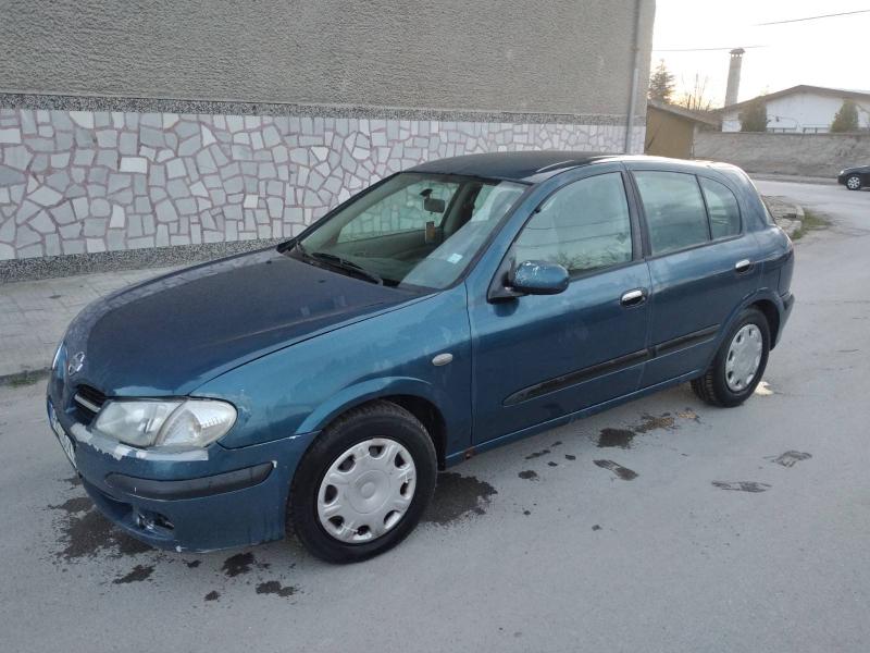 Nissan Almera 1.6 - изображение 6