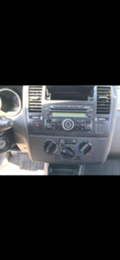 Nissan Tiida 1.5 DCI - изображение 10