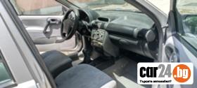 Opel Corsa 1.0i - [7] 