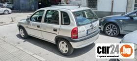 Opel Corsa 1.0i - [9] 