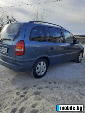     Opel Zafira ~5 000 .