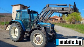      New Holland 7740 4WD ~31 000 .
