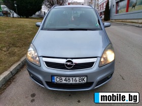     Opel Zafira ~6 200 .