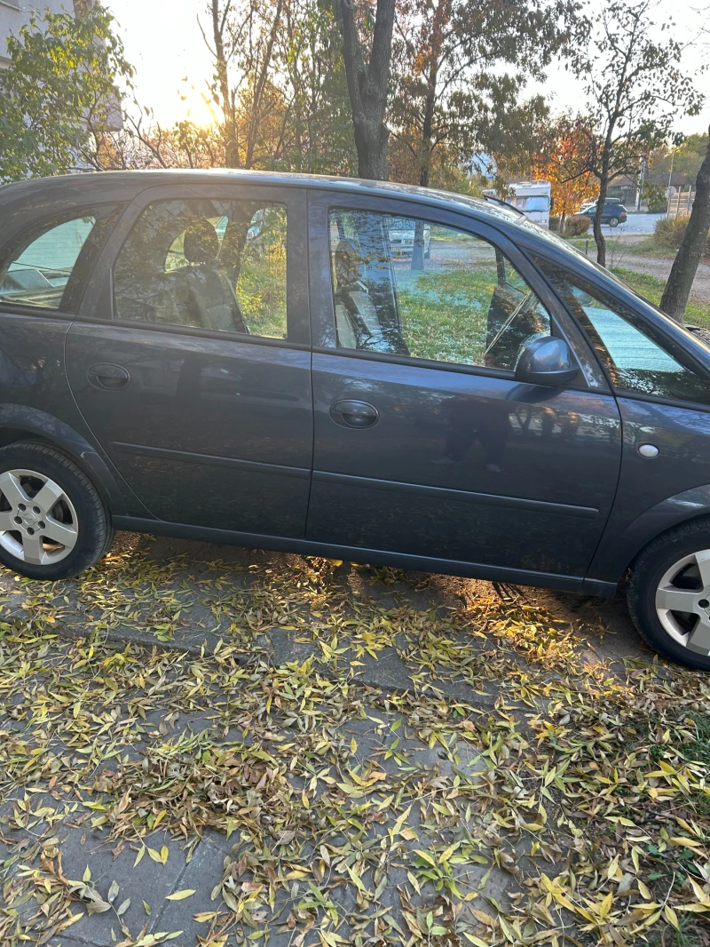 Opel Meriva, снимка 4 - Автомобили и джипове - 47735797