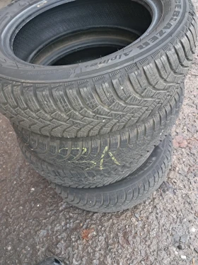 Гуми Зимни 155/65R14, снимка 1 - Гуми и джанти - 48601239