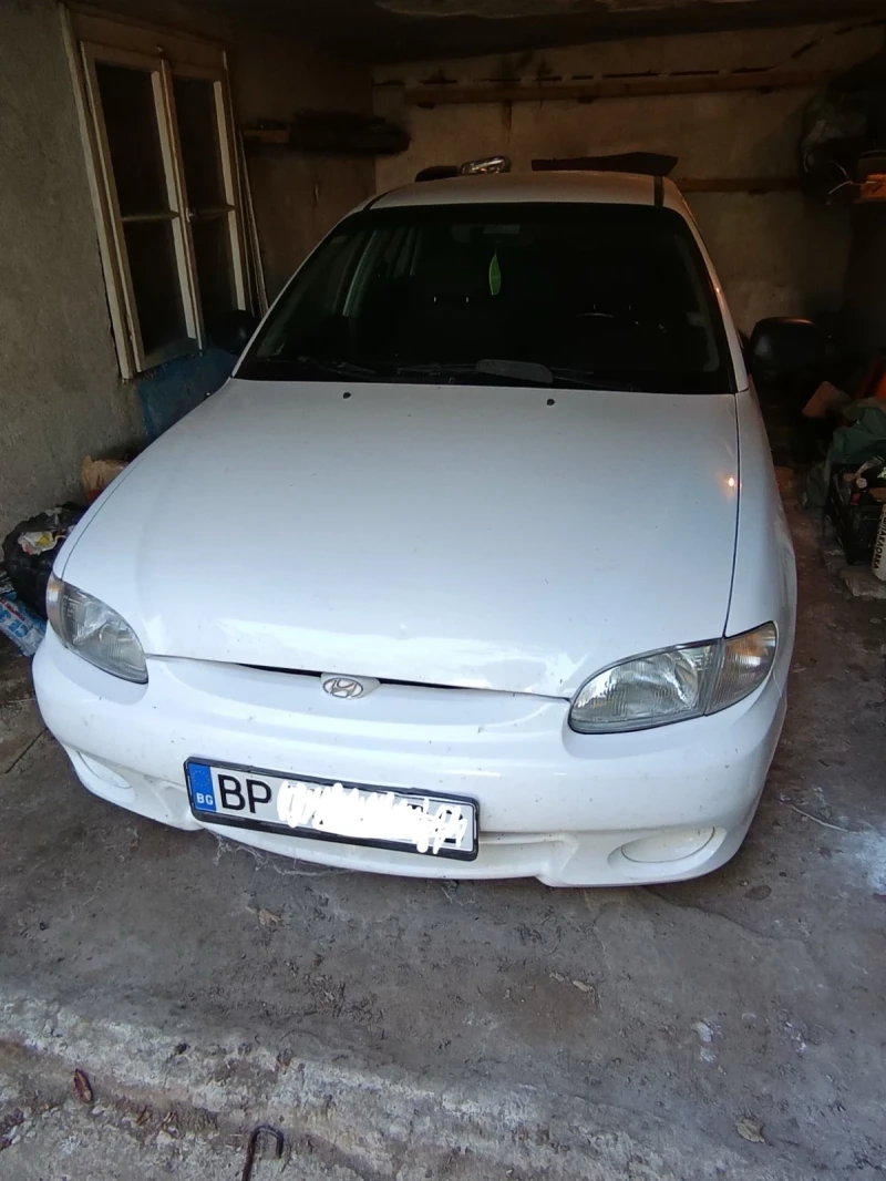 Hyundai Accent 1.3 i, снимка 8 - Автомобили и джипове - 47398571