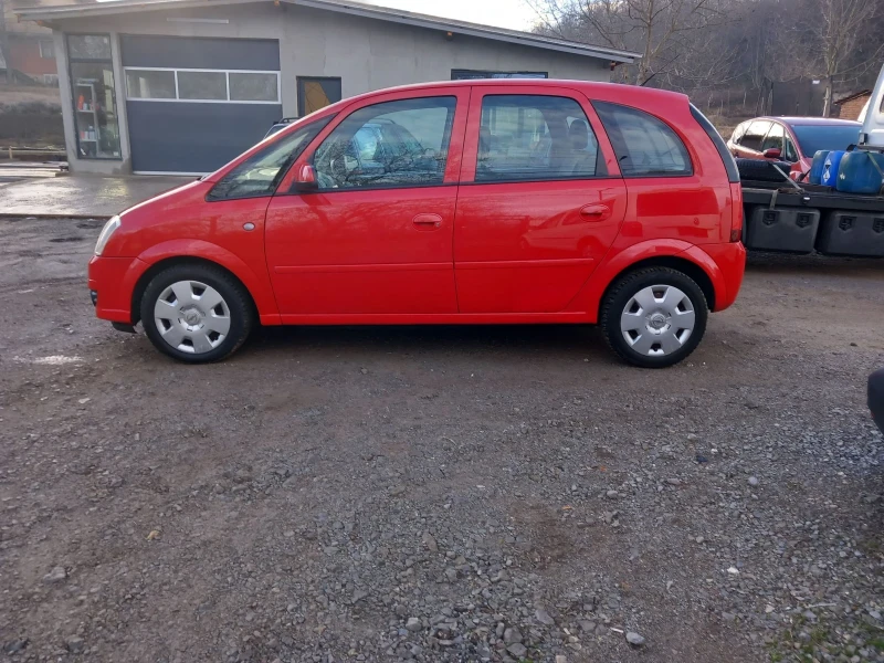 Opel Meriva 1.3multiget feislift , снимка 8 - Автомобили и джипове - 48884080