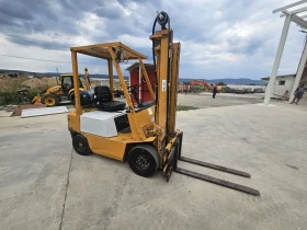      Komatsu 