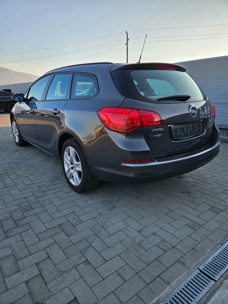 Opel Astra 1.7дизел, Перфектна, снимка 4 - Автомобили и джипове - 49255196