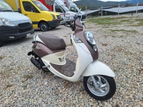     Sym Mio 50i 2014 . 