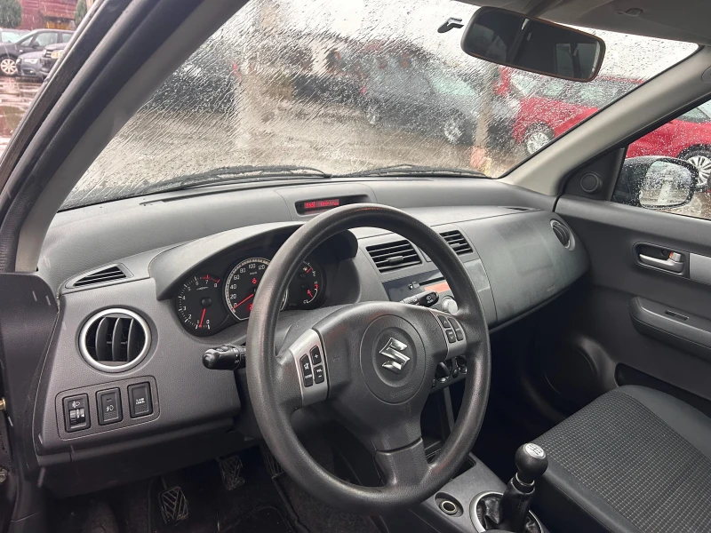 Suzuki Swift 1.3i EURO 4, снимка 11 - Автомобили и джипове - 52896320