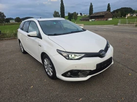 Toyota Auris 1.8-Хибрид-Хечбек, снимка 2