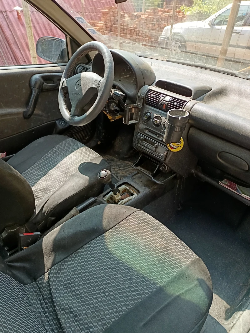 Opel Corsa, снимка 9 - Автомобили и джипове - 47440388