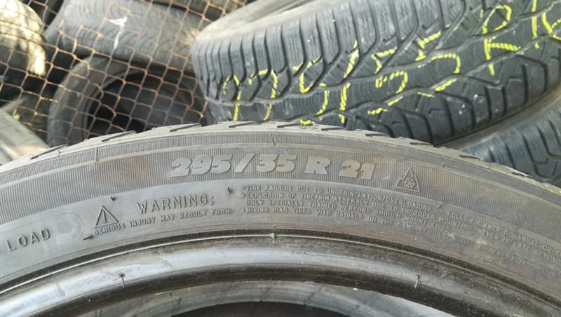 Гуми Зимни 295/35R21, снимка 6 - Гуми и джанти - 26754617