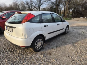 Ford Focus 1.8 TD  обслужен със винетка - 999 € / 1953.87 лв. - 13734124 3
