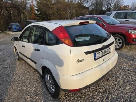 Ford Focus 1.8 TD  обслужен със винетка - 999 € / 1953.87 лв. - 13734124 4