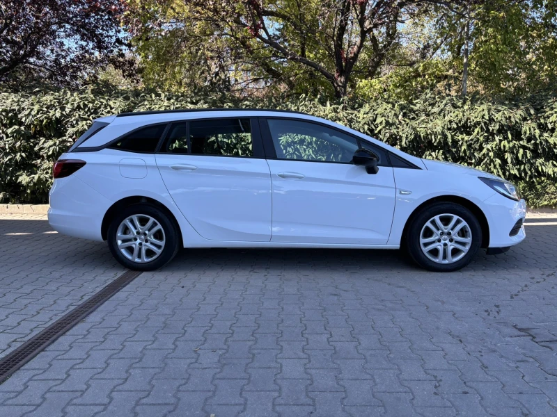 Opel Astra Elegance Sports Tourer, снимка 4 - Автомобили и джипове - 48051487