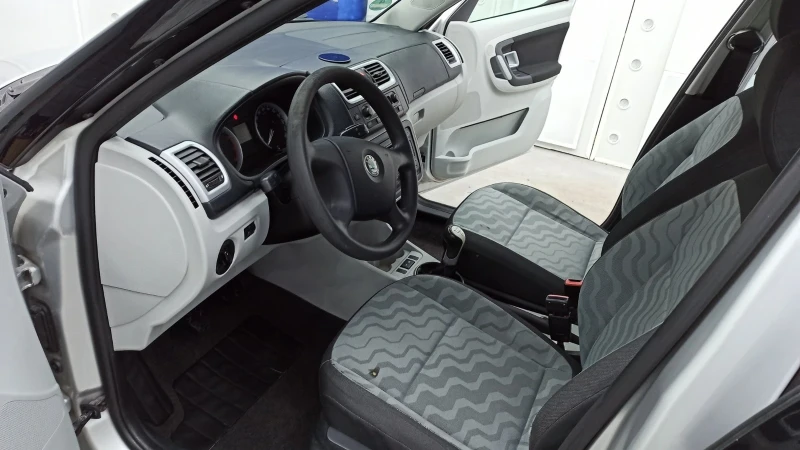 Skoda Roomster 1.4 бензин , снимка 13 - Автомобили и джипове - 53075906