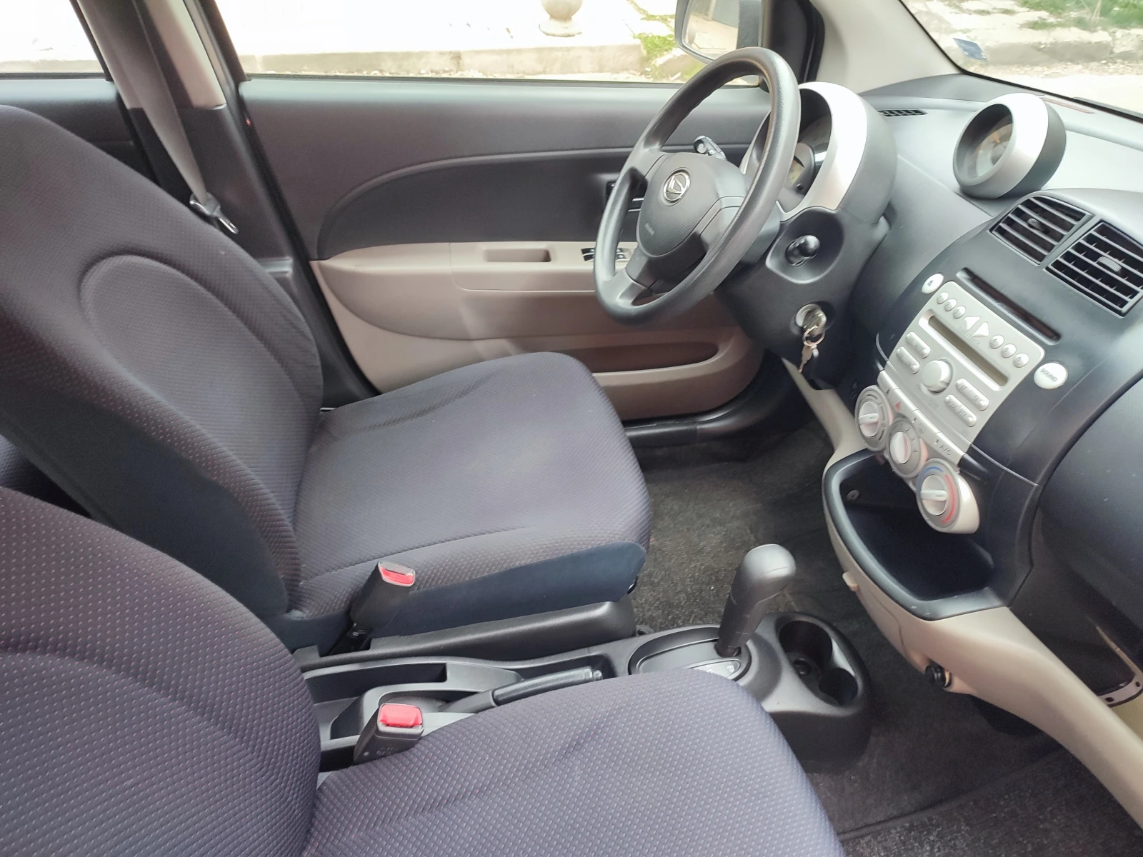 Daihatsu Sirion 1.3i-87kc-АВТОМАТИК-КЛИМАТИК-ЕВРО4, снимка 11 - Автомобили и джипове - 53908677