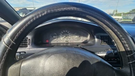 Mazda 323 Familia 1.3 Газ/бензин, снимка 13