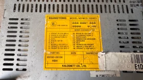 Оригинална Аудио / GPS и видео система за Ssang Yong Kyron - 89100-09100 / 9CA04077, снимка 2 - Части - 52713260