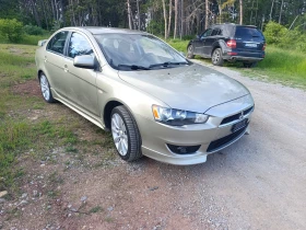 ������ Mitsubishi Lancer