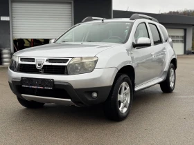 Dacia Duster 1.6i 4x4 , снимка 3