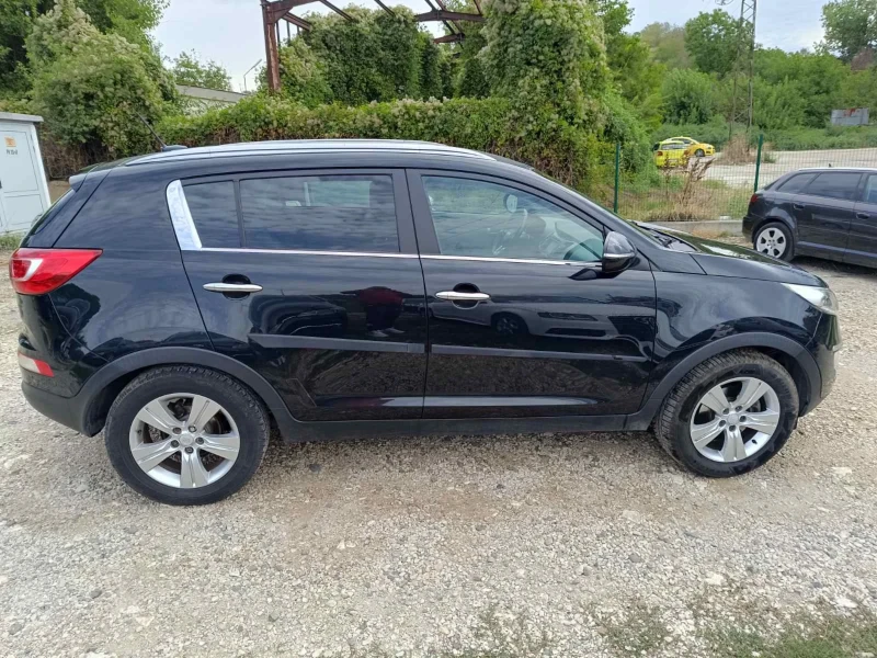 Kia Sportage  LPG ПРИНС. НАВИ. КОЖА. КАМЕРА. ТЕГЛИЧ, снимка 4 - Автомобили и джипове - 52583251