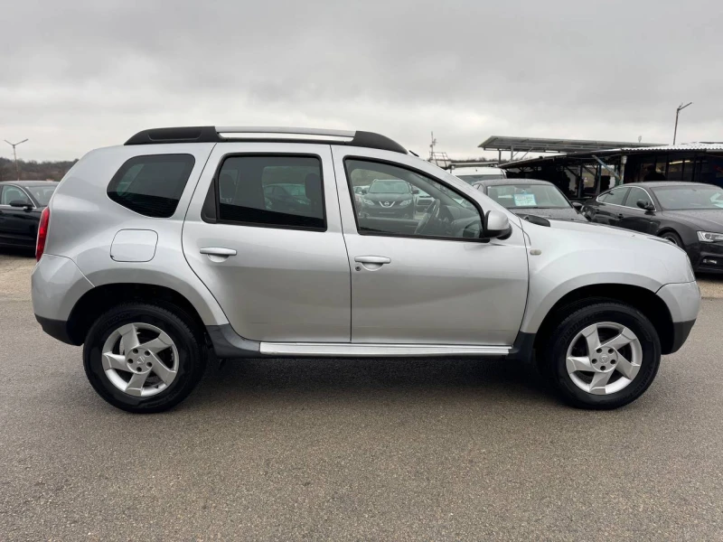 Dacia Duster 1.6i 4x4 -10%, снимка 7 - Автомобили и джипове - 52468731